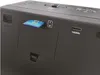 A close-up view of the side of a black electronic device, showing various ports and a memory card inserted. Produktbild-Vorschau