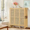 A shoe cabinet with a handbag hanging on the side, placed in a room with a window and curtains. Podgląd zdjęcia produktu
