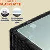 Close-up of a black polyrattan garden table with a glass top, highlighting its features. Anteprima dell’immagine prodotto
