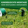 A spool of green wire is shown on grass, with stakes and a clip holding the wire in place. Anteprima dell’immagine prodotto