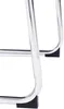 Close-up of the legs of a stool or chair with chrome-plated metal and black plastic feet. Anteprima dell’immagine prodotto