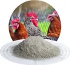 A pile of grey powder in front of a circular image of chickens. Produktbild-Vorschau