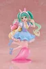 A figurine of Hatsune Miku in a fairy tale outfit, standing on a pink base. Produktbild-Vorschau