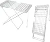 A white electric heated clothes drying rack shown in two different positions: unfolded and folded. Produktbild-Vorschau