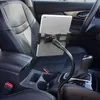 A tablet holder mounted in a car's center console. Produktbild-Vorschau