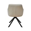 Rear view of a beige upholstered swivel dining chair with black metal legs. Produktbild-Vorschau