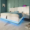 A modern white bed with blue LED lighting underneath, set in a bedroom with teal paneled walls and a patterned rug. Produktbild-Vorschau