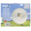 The image shows the packaging of a Bluey-themed 3-piece dinnerware set for children. The packaging features illustrations of the characters Bluey and Bingo, along with product information in multiple languages. Voir les images du produit