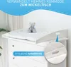 A white changing table attachment on top of a white dresser, with a teddy bear on it. Podgląd zdjęcia produktu