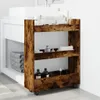 A narrow storage cart with three shelves is placed next to a bathroom vanity. The cart is filled with various bathroom items, including towels and bottles. Náhled obrázku produktu