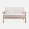 A beige 2-seater bench with wooden legs is shown against a white background. Anteprima dell’immagine prodotto