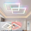 A modern LED ceiling light with multiple square frames, displaying various colors, shown in a room setting and in close-up views with different lighting. Produktbild-Vorschau