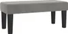 A studio shot of a gray velvet bench with black legs. Náhľad obrázku produktu