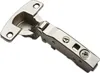 A close-up studio shot of a metal cabinet hinge against a white background. Produktbild-Vorschau