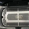 A close-up overhead view of two stainless steel grill grates with a wavy pattern, designed for a Weber Traveler grill. Produktbild-Vorschau