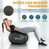 A woman is doing crunches on a gym ball in a bright room. Produktbild-Vorschau