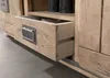 A close-up view of a wooden sideboard drawer with a metal handle. Voir les images du produit