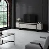 A modern living room with a TV stand, coffee table, and armchair. Produktbild-Vorschau