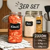 Three glass jars with clamp lids filled with food items, placed on a checkered cloth. Text overlays indicate product details and capacity. Podgląd zdjęcia produktu