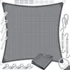 A square gray sun sail with various accessories laid out around it. Produktbild-Vorschau