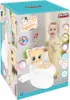 The image shows the packaging of a Pilsan Cat Educational Potty, with a baby standing next to it. Produktbild-Vorschau