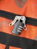 A close-up of a combination lock on a luggage zipper. Produktbild-Vorschau