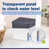 A dehumidifier unit is shown on a washing machine, with a basket of towels to the left. Text overlays highlight a transparent panel for checking water level. Produktbild-Vorschau