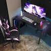 A gaming desk setup with a chair, computer, and monitor. Produktbild-Vorschau