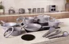A set of gray cookware and utensils arranged on a countertop. Náhled obrázku produktu