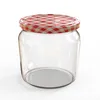 A clear, studio shot of an empty glass jar with a red and white checkered lid. Voir les images du produit