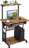 A computer desk with a monitor, keyboard, mouse, and computer tower. Produktbild-Vorschau