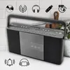 A DAB+ radio with a CD player is shown on a countertop with a tiled backsplash. Voir les images du produit