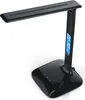 A black LED desk lamp with a digital display on a white background. Anteprima dell’immagine prodotto