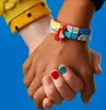 LEGO DOTS Tęczowa bransoletka z zawieszkami, Zestaw do Podgląd zdjęcia produktu 6