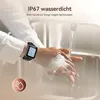 A person is washing their hands under a faucet, wearing a smartwatch. The image highlights the watch's water resistance. Náhled obrázku produktu