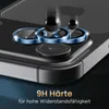 Close-up of a smartphone camera lens protector with blue metallic rings, with two black spheres falling towards it. Produktbild-Vorschau