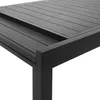A close-up view of a dark gray outdoor table with a slatted surface and black metal legs. Náhled obrázku produktu