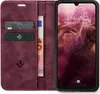 A flip-style phone case with card slots and a phone inside, displaying the time and date. Produktbild-Vorschau
