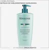 A bottle of Kerastase shampoo with text overlays. Náhled obrázku produktu