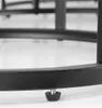A close-up view of the adjustable foot of a black metal table leg. Produktbild-Vorschau