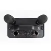 A top-down view of a black karaoke machine with two microphones attached. Produktbild-Vorschau