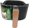 A close-up view of the basket and handle of a black Philips Airfryer with a rose gold handle, set against a white background. A green sticker with product information and images is attached to the side of the airfryer. Produktbild-Vorschau