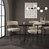 A dining room setting with chairs around a table. Produktbild-Vorschau