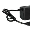 A close-up of a black power adapter and its coiled cable. Produktbild-Vorschau