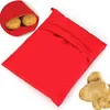 A red potato microwave bag with potatoes inside and a few loose potatoes next to it. Produktbild-Vorschau