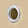 A close-up of a metal grommet on a fabric surface. Produktbild-Vorschau