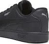 A close-up side view of a black Puma sneaker. Produktbild-Vorschau