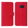 A red flip phone case with a floral and butterfly design is shown from the front and back. Produktbild-Vorschau