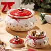 Christmas-themed ceramic cookie jars and a Christmas tree. Náhled obrázku produktu