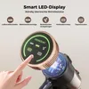 A hand is shown interacting with the display of a cordless vacuum cleaner. Produktbild-Vorschau